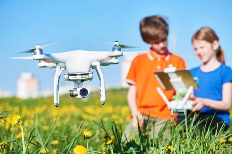 Kids playing with a drone